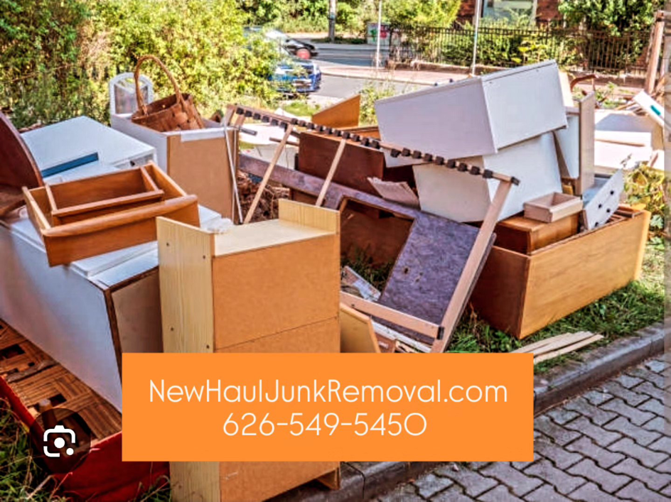 A large pile of household junk and debris placed curbside for pickup by New Haul Junk Removal in South El Monte, CA.