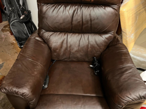 A brown leather recliner chair ready for general junk removal by Junk2Dump in Sacramento, CA.