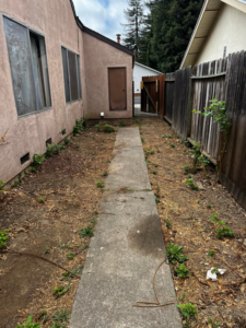 A cleared backyard after a successful junk removal service, showing the clean result by We Haul It All in Lakeland, FL