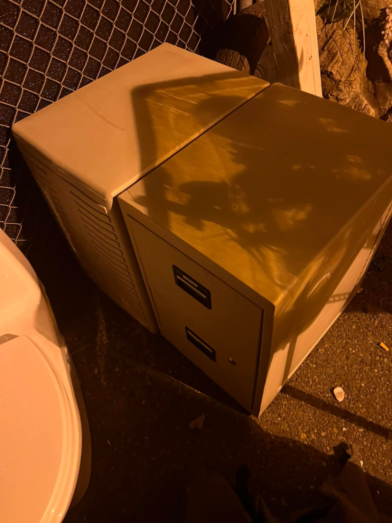 Two filing cabinets and a toilet placed outdoors for general junk removal by Junk2Dump in Sacramento, CA.