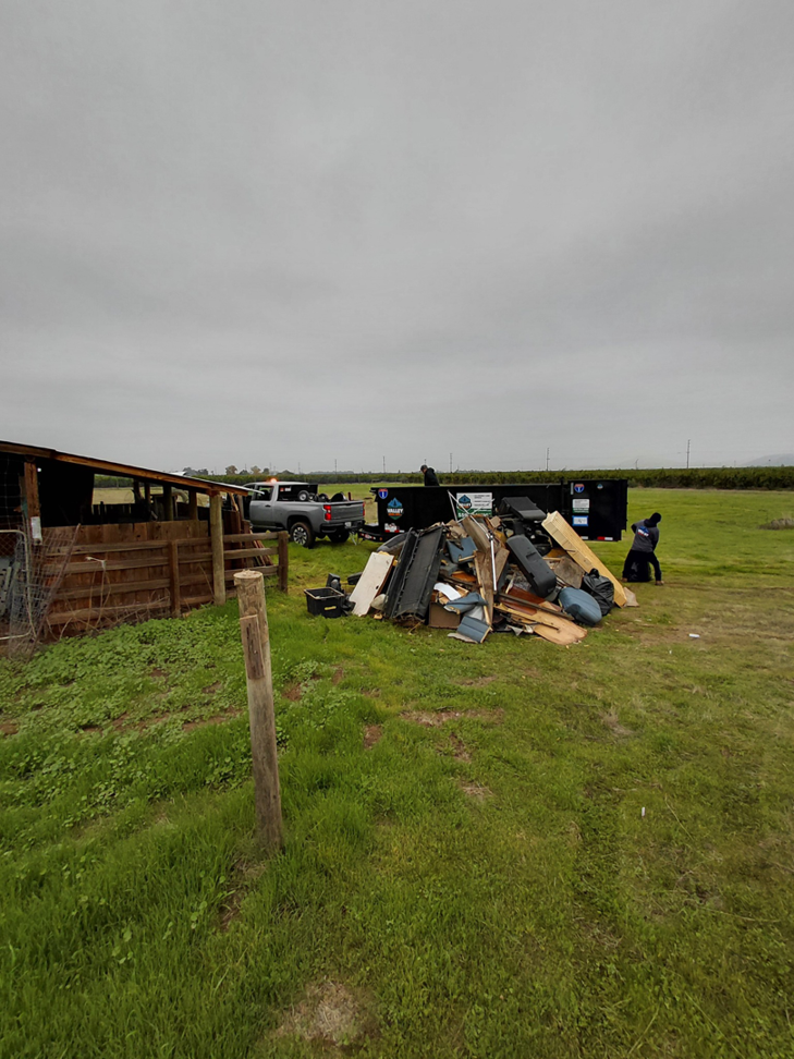 A large pile of general junk being prepared for removal by Valley Haul Off LLC in Visalia, CA